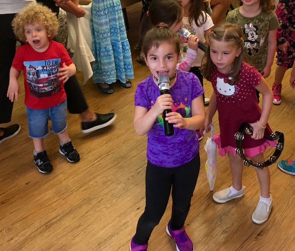 Kids singing karaoke at NYC children's Birthday party